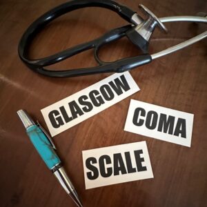 Glasgow Coma Scale with pen and stethoscope